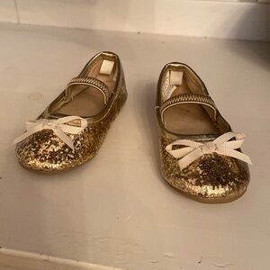 Golden glitter slip-ons